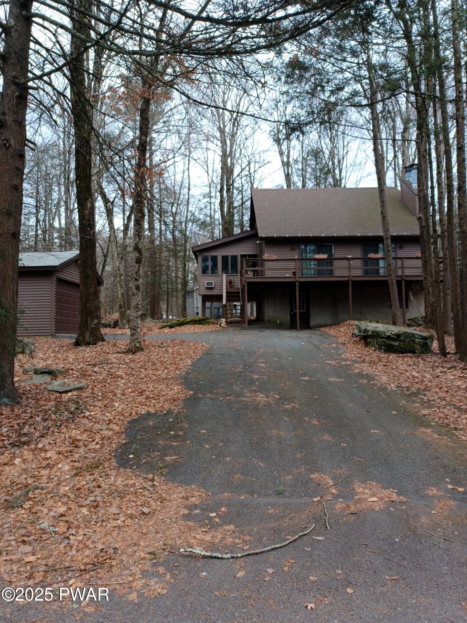 540 Northgate Road Lake Ariel, PA 18436 - Photo 2 of 40 a view of a house with a yard and tree