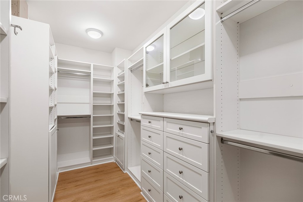 70 Livia Irvine, CA 92618 - Photo 24 of 47 Fashionable flooring and window treatments are on display throughout the home, and each bedroom hosts a custom built-in closet system.