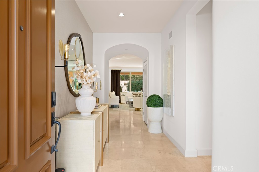 70 Livia Irvine, CA 92618 - Photo 3 of 47 Nestled in a prime location near the top of a private cul-de-sac street, the elegantly renovated residence greets everyone with a welcoming covered entrance that opens to a spacious, timeless and inviting design of approximately 2,912 square feet.