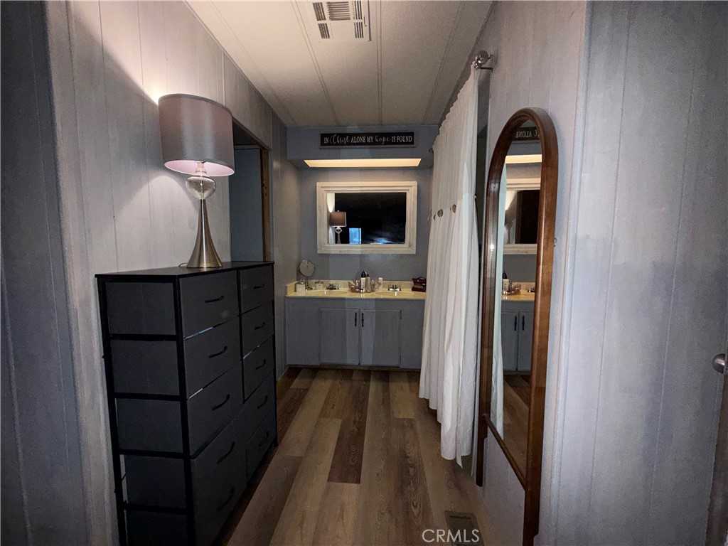 32600 State Highway 74, Unit 140 Hemet, CA 92545 - Photo 14 of 30 a view of a hallway and a livingroom with furniture