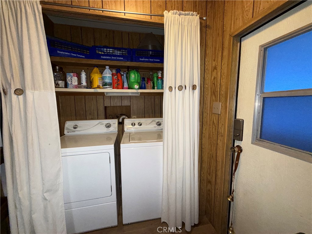 32600 State Highway 74, Unit 140 Hemet, CA 92545 - Photo 17 of 30 a utility room with dryer and washer