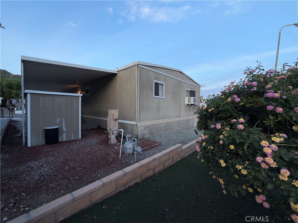 32600 State Highway 74, Unit 140 Hemet, CA 92545 - Photo 18 of 30 a house view with a outdoor space