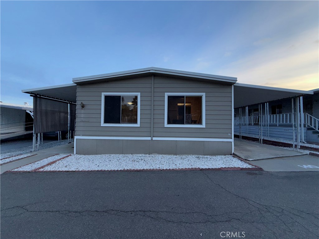 32600 State Highway 74, Unit 140 Hemet, CA 92545 - Photo 2 of 30 a front view of a house