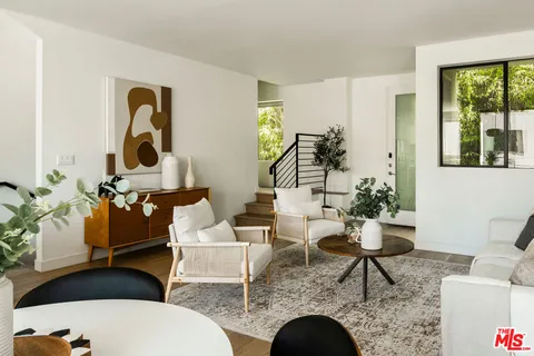 a living room filled with furniture