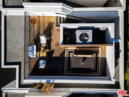 a stove top oven sitting inside of a kitchen