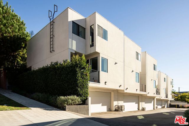 a front view of a building with street