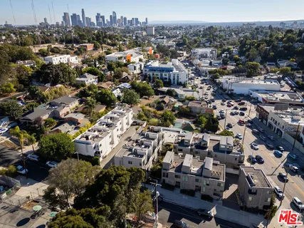 an aerial view of a city with lots of residential buildings
