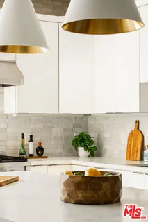 a bathroom with a tub and sink