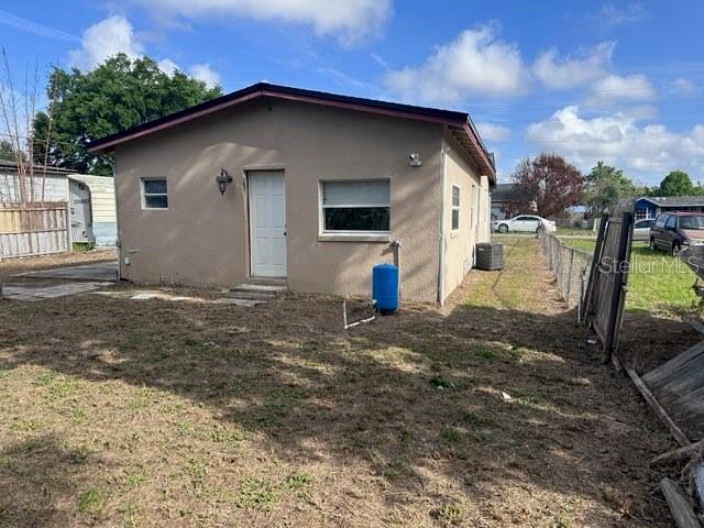 10030 Ingram Avenue Ocoee, FL 34761 - Photo 6 of 16 a view of a house with a yard