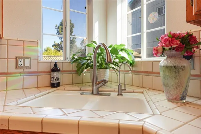 a vase of flowers sitting on a table