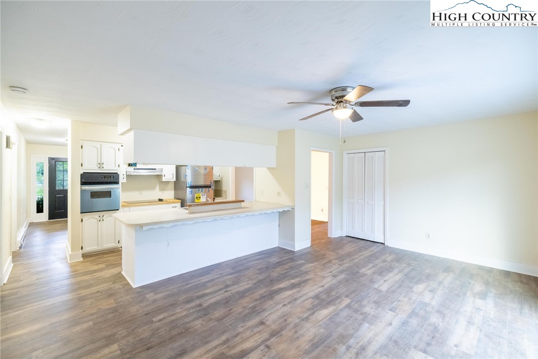 898 3 Top Road Creston, NC 28615 - Photo 26 of 48 a view of kitchen with sink microwave and refrigerator