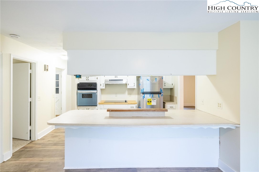898 3 Top Road Creston, NC 28615 - Photo 27 of 48 a large bathroom with a sink and a mirror