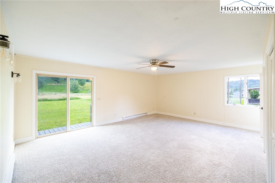 898 3 Top Road Creston, NC 28615 - Photo 30 of 48 an empty room with a window