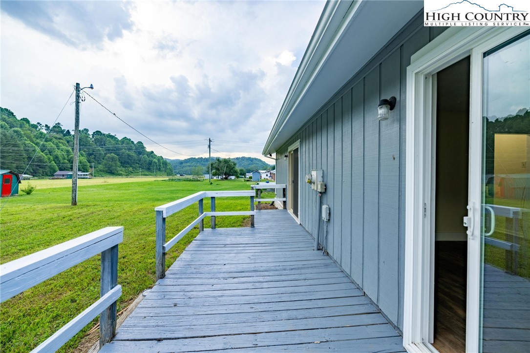 898 3 Top Road Creston, NC 28615 - Photo 38 of 48 a view of a park with stairs and wooden fence