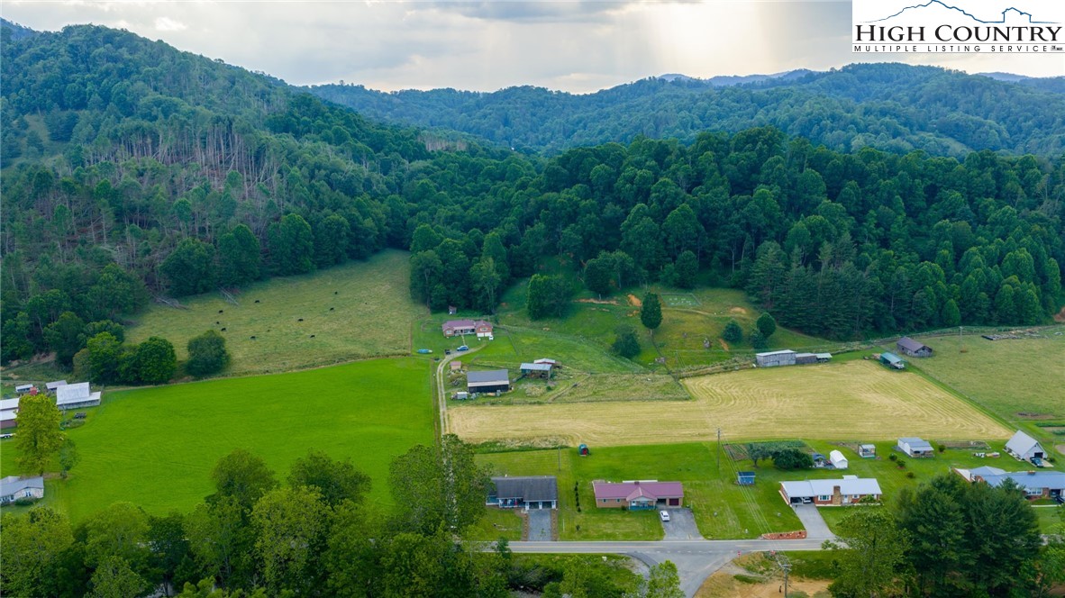 898 3 Top Road Creston, NC 28615 - Photo 43 of 48 a view of an house with a yard