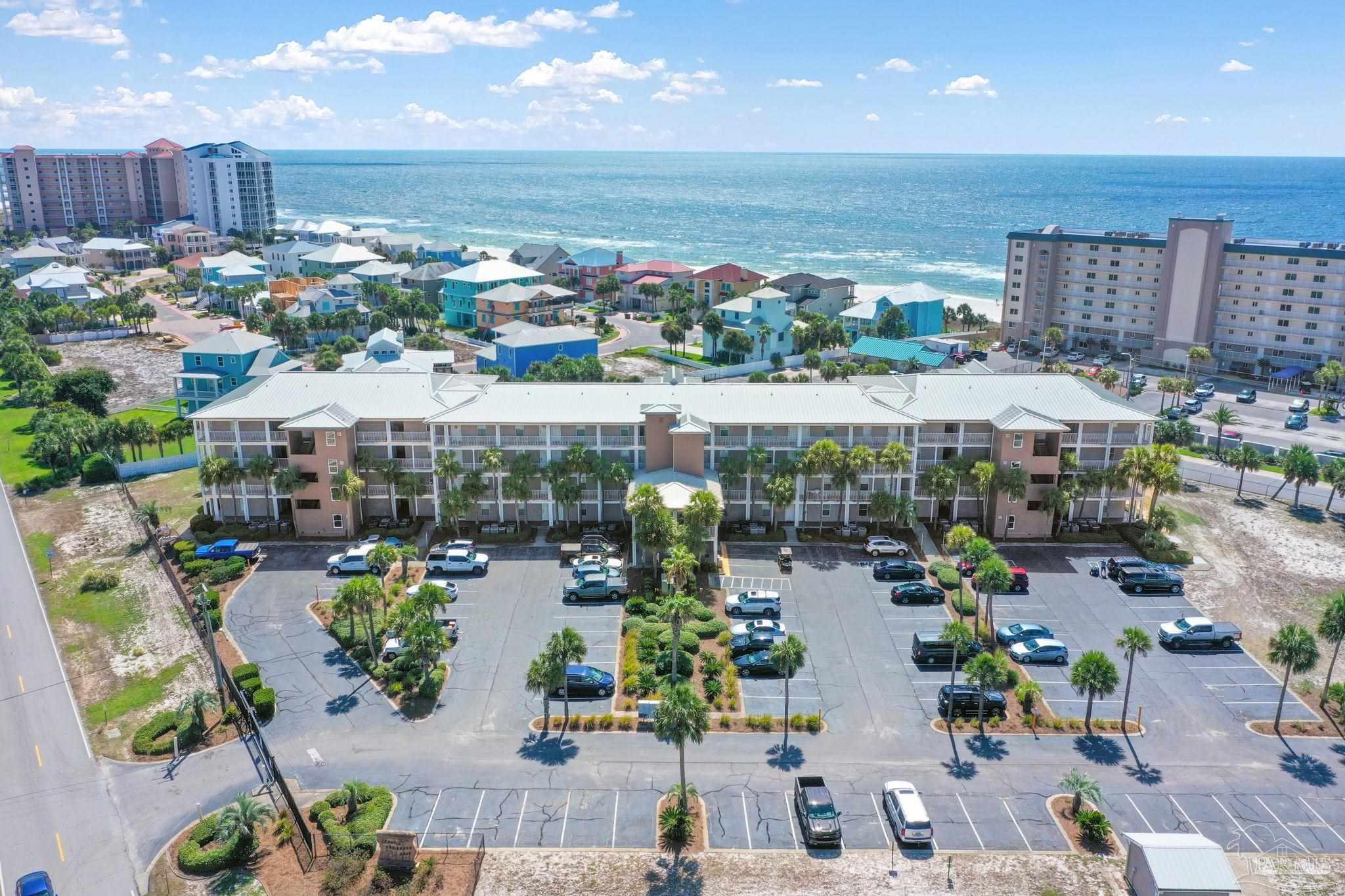 13351 Johnson Beach Road, Unit 203E Perdido Key, FL 32507 - Photo 53 of 55 an aerial view of a building with outdoor space