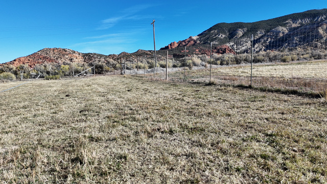 890 East Hatchery Road Bicknell, UT 84715 - Photo 19 of 48 View of mountain backdrop featuring rural landscape