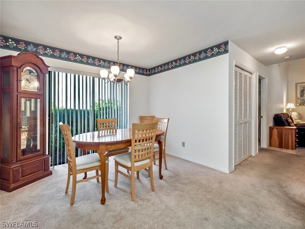 13166 Heather Ridge Loop Fort Myers, FL 33966 - Photo 14 of 31 a dining room with furniture and window