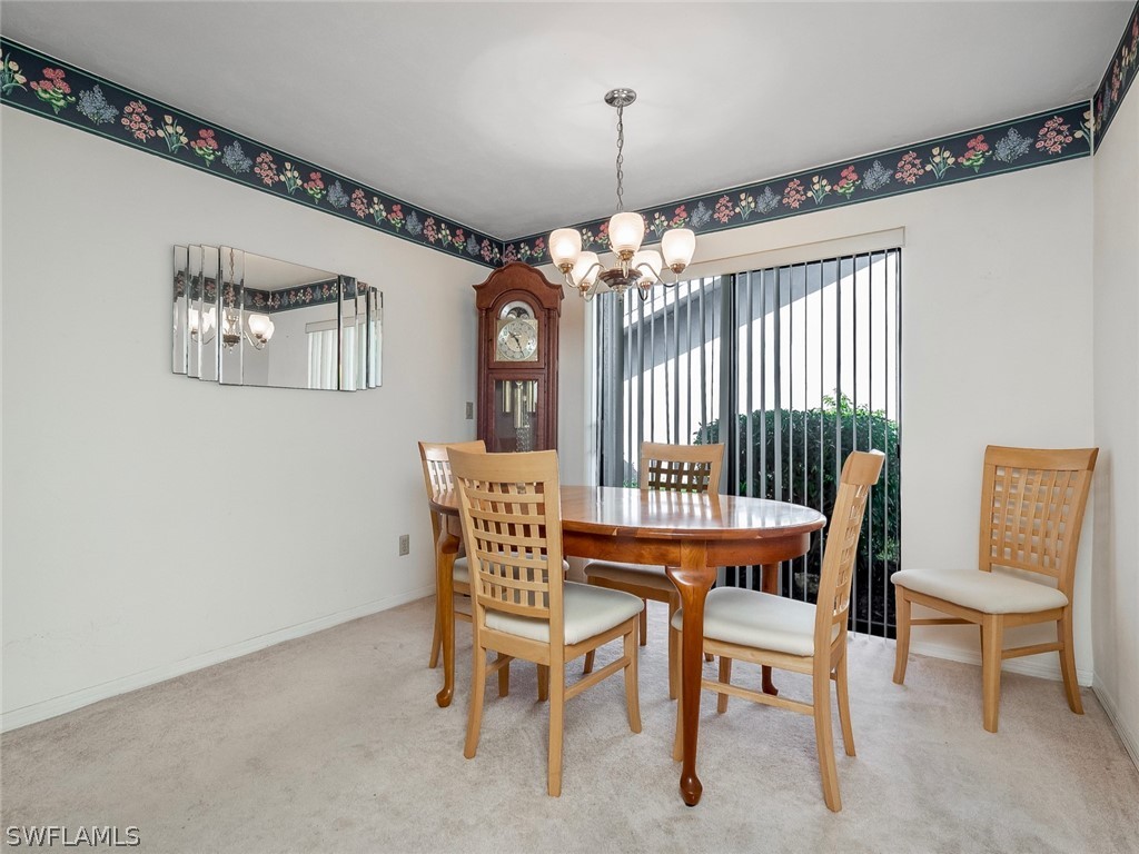 13166 Heather Ridge Loop Fort Myers, FL 33966 - Photo 15 of 31 a dining room with furniture and window