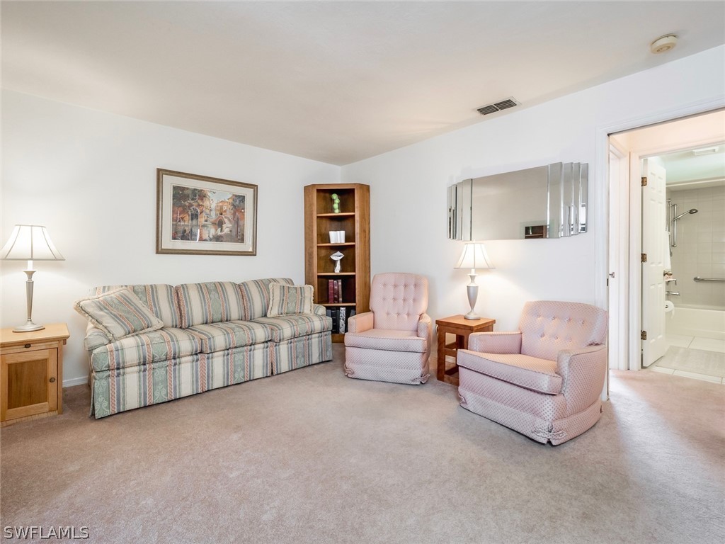 13166 Heather Ridge Loop Fort Myers, FL 33966 - Photo 17 of 31 a living room with furniture and a couch