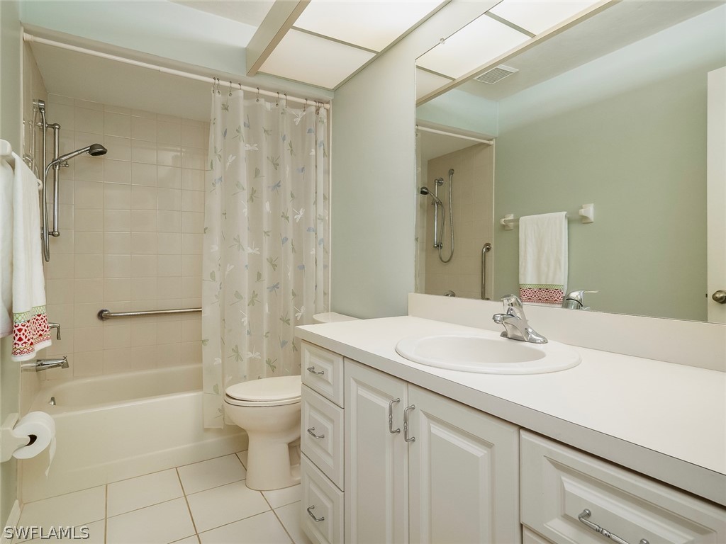 13166 Heather Ridge Loop Fort Myers, FL 33966 - Photo 24 of 31 a bathroom with a sink a toilet and shower