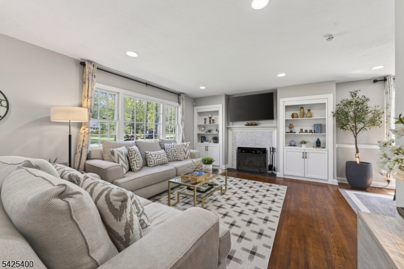 28 Spring Ridge Drive Berkeley Heights, NJ 07922 - Photo 2 of 46 a living room with furniture fireplace and window