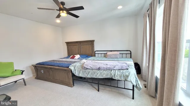 a view of game room with stairs and toys