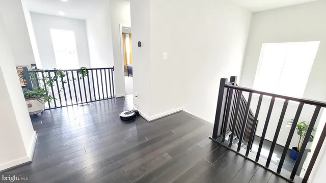 a spacious bathroom with a bathtub and sink