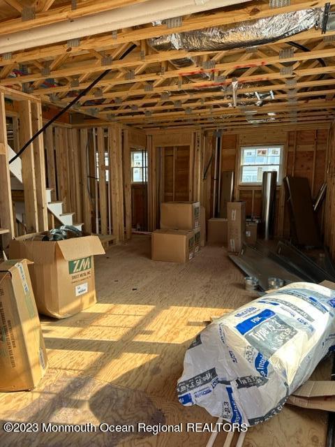 23 Shell Road, Unit 57 Mantoloking, NJ 08738 - Photo 6 of 17 a view of a patio with table and chairs