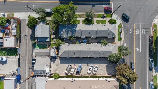 a view of street with parked cars