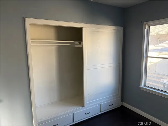 a bathroom with a toilet and a sink