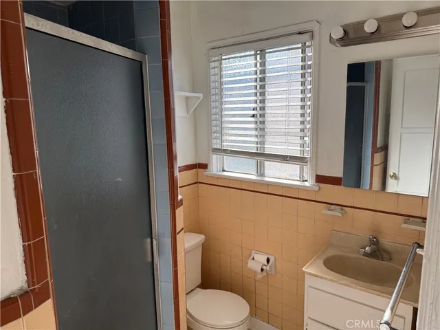 a kitchen with a cabinets and window
