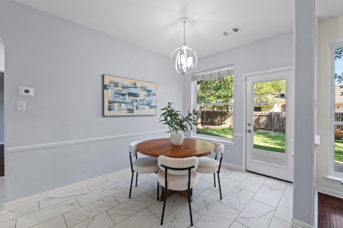 1601 Michael Robert Way Cedar Park, TX 78613 - Photo 14 of 35 a view of a dining room with furniture window and outside view