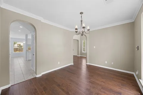 a bathroom with a sink toilet and a mirror