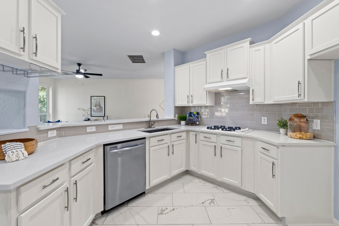 1601 Michael Robert Way Cedar Park, TX 78613 - Photo 2 of 35 a kitchen with cabinets appliances and a sink