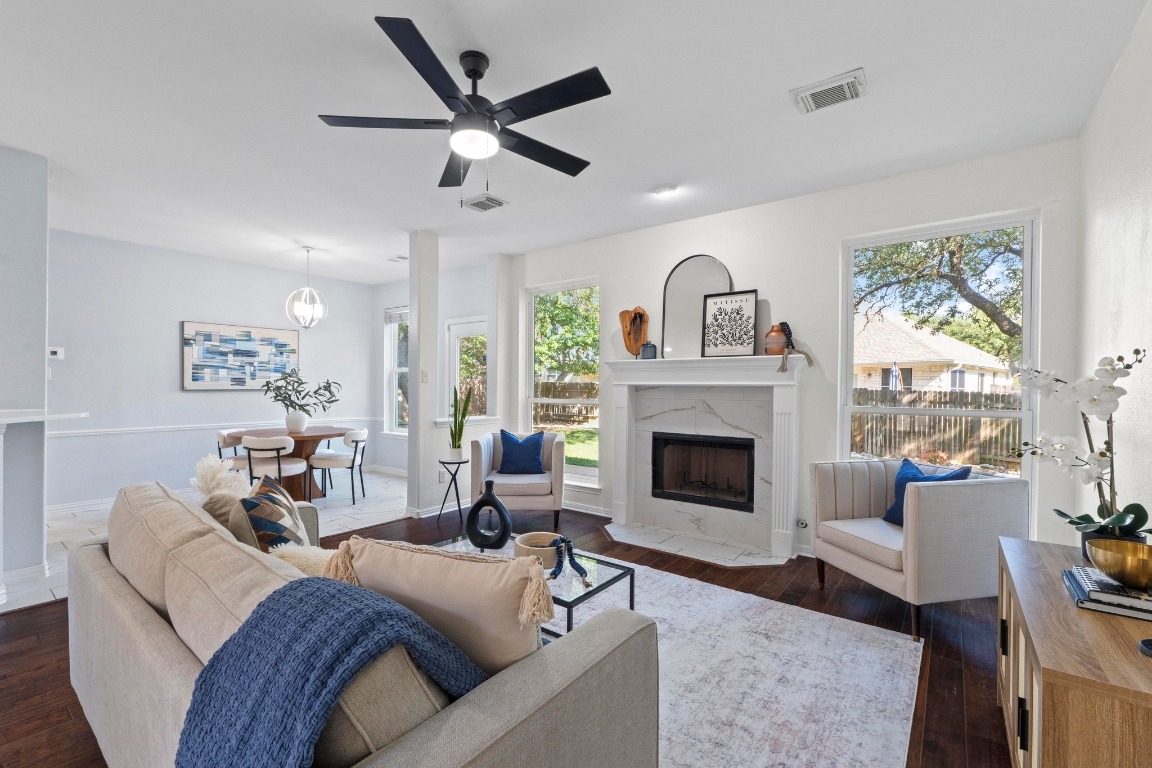 1601 Michael Robert Way Cedar Park, TX 78613 - Photo 9 of 35 a living room with furniture and a fireplace