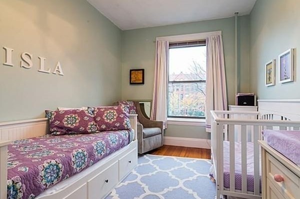 1060 Beacon Street, Unit 5 Brookline, MA 02446 - Photo 4 of 6 a living room with furniture and a rug