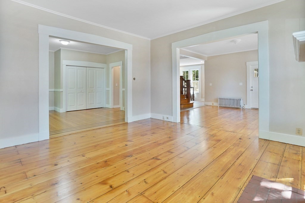 123 Springfield Street Chicopee, MA 01013 - Photo 14 of 42 a view of empty room with wooden floor