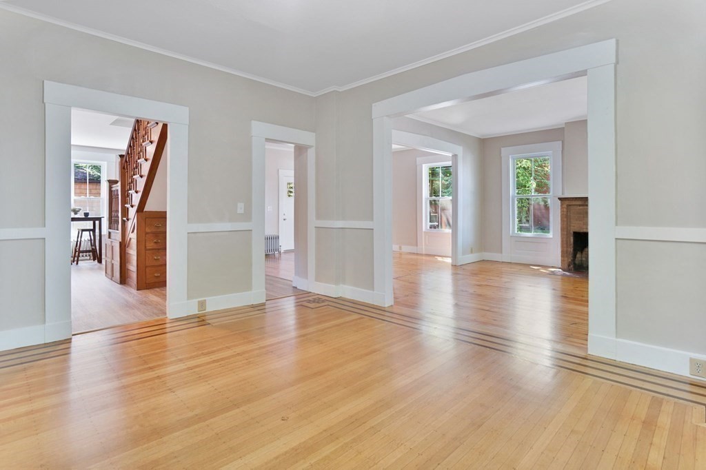 123 Springfield Street Chicopee, MA 01013 - Photo 17 of 42 wooden floor in an empty room with a window