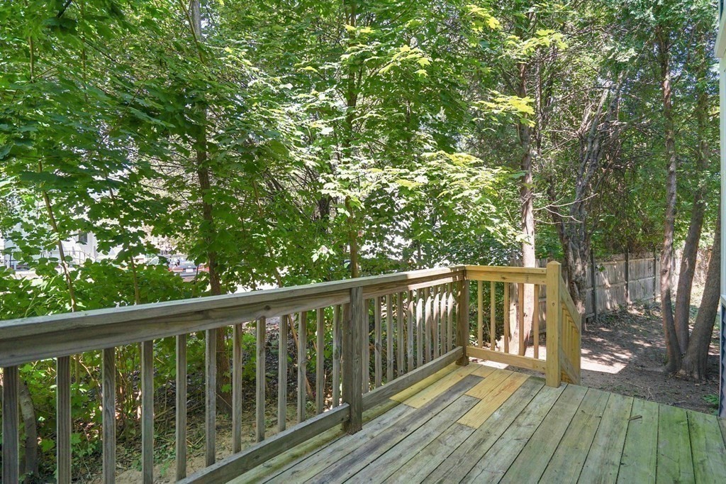 123 Springfield Street Chicopee, MA 01013 - Photo 38 of 42 a view of balcony with wooden floor