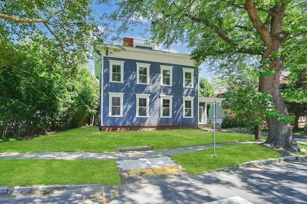 123 Springfield Street Chicopee, MA 01013 - Photo 39 of 42 a view of a house with a yard
