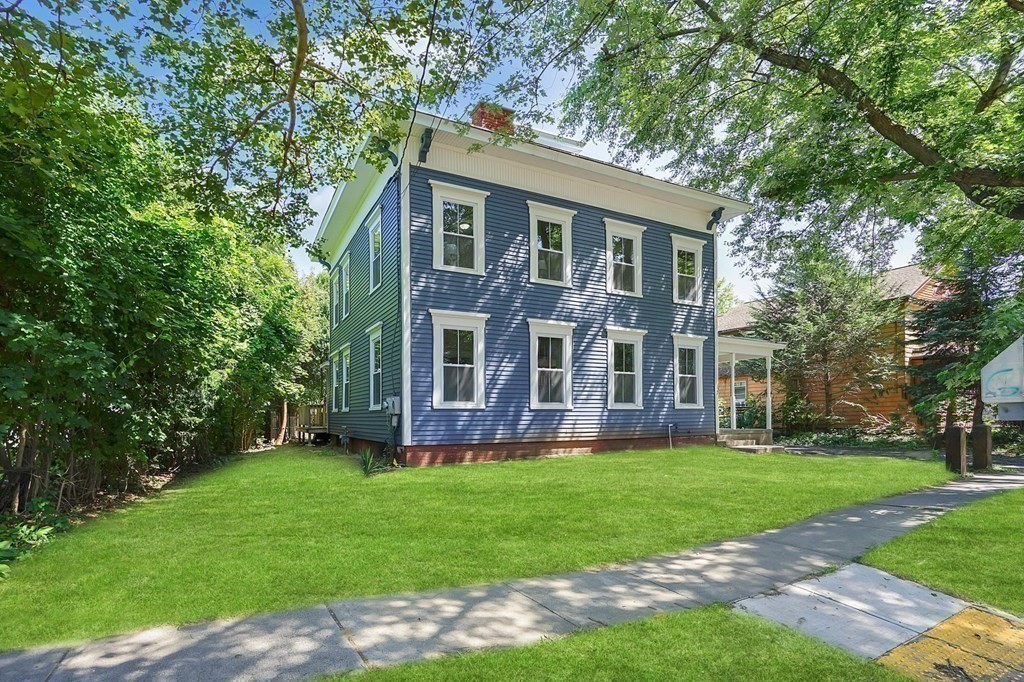 123 Springfield Street Chicopee, MA 01013 - Photo 40 of 42 front view of a house with a yard