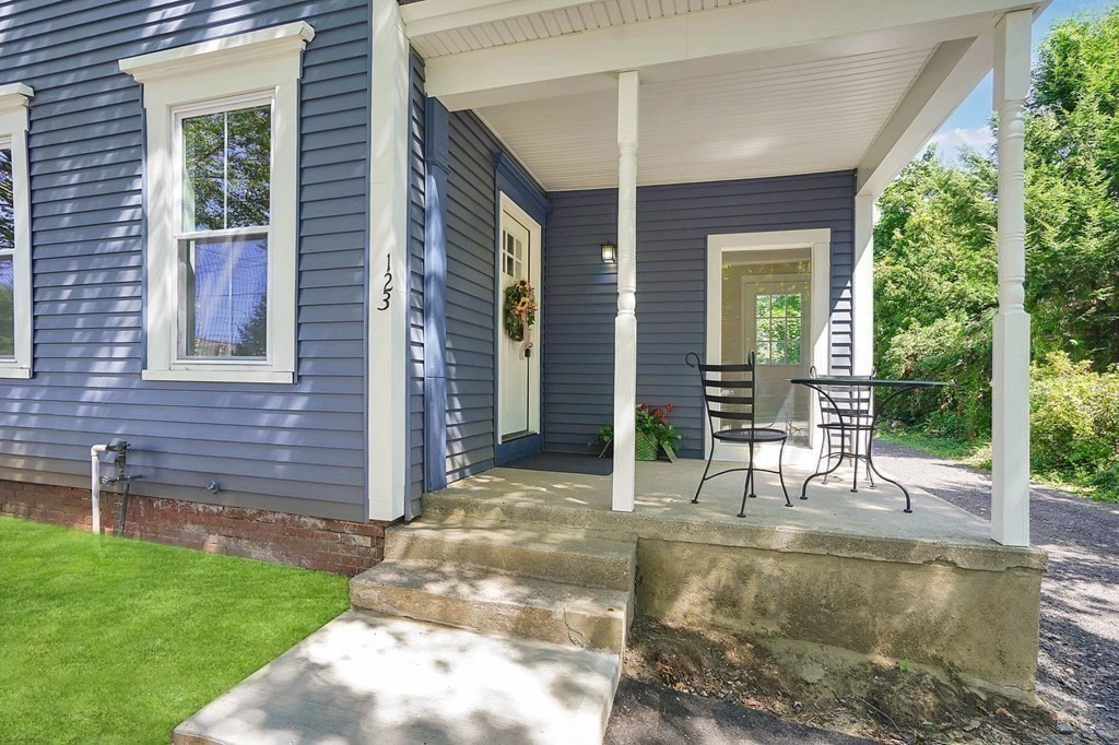 123 Springfield Street Chicopee, MA 01013 - Photo 41 of 42 a view of backyard with a garden and seating space