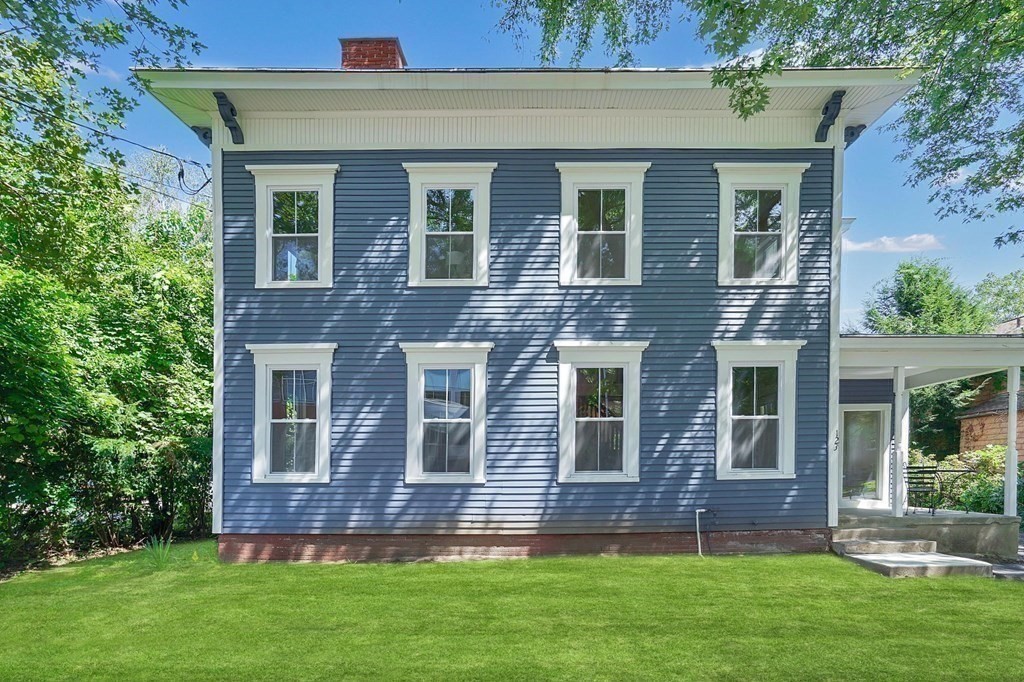 123 Springfield Street Chicopee, MA 01013 - Photo 42 of 42 front view of a house with a yard