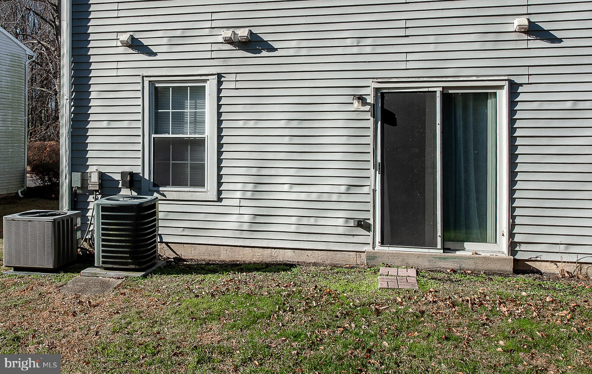 1010 Huntingdon Mews Clementon, NJ 08021 - Photo 19 of 19 a view of a house with a yard and garage