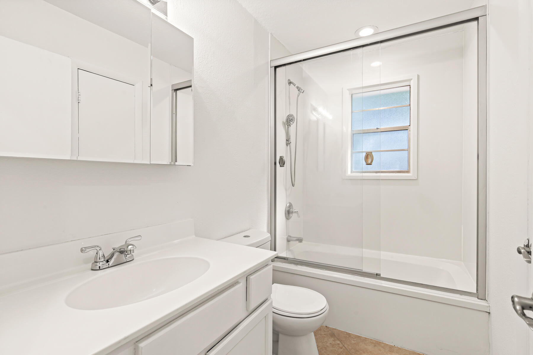 612 Beach Drive Destin, FL 32541 - Photo 19 of 34 a bathroom with a sink toilet and shower