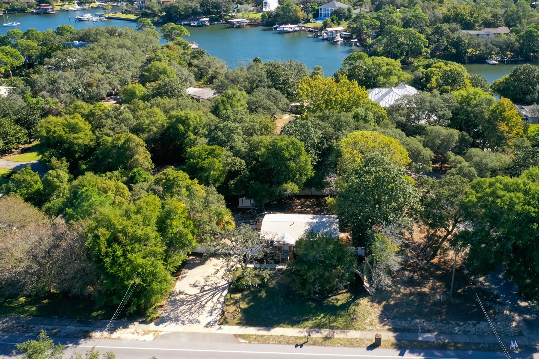 612 Beach Drive Destin, FL 32541 - Photo 26 of 34 an aerial view of a houses with yard