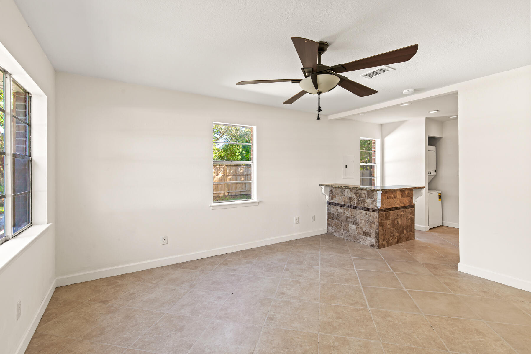 612 Beach Drive Destin, FL 32541 - Photo 10 of 34 a view of an empty room with a window