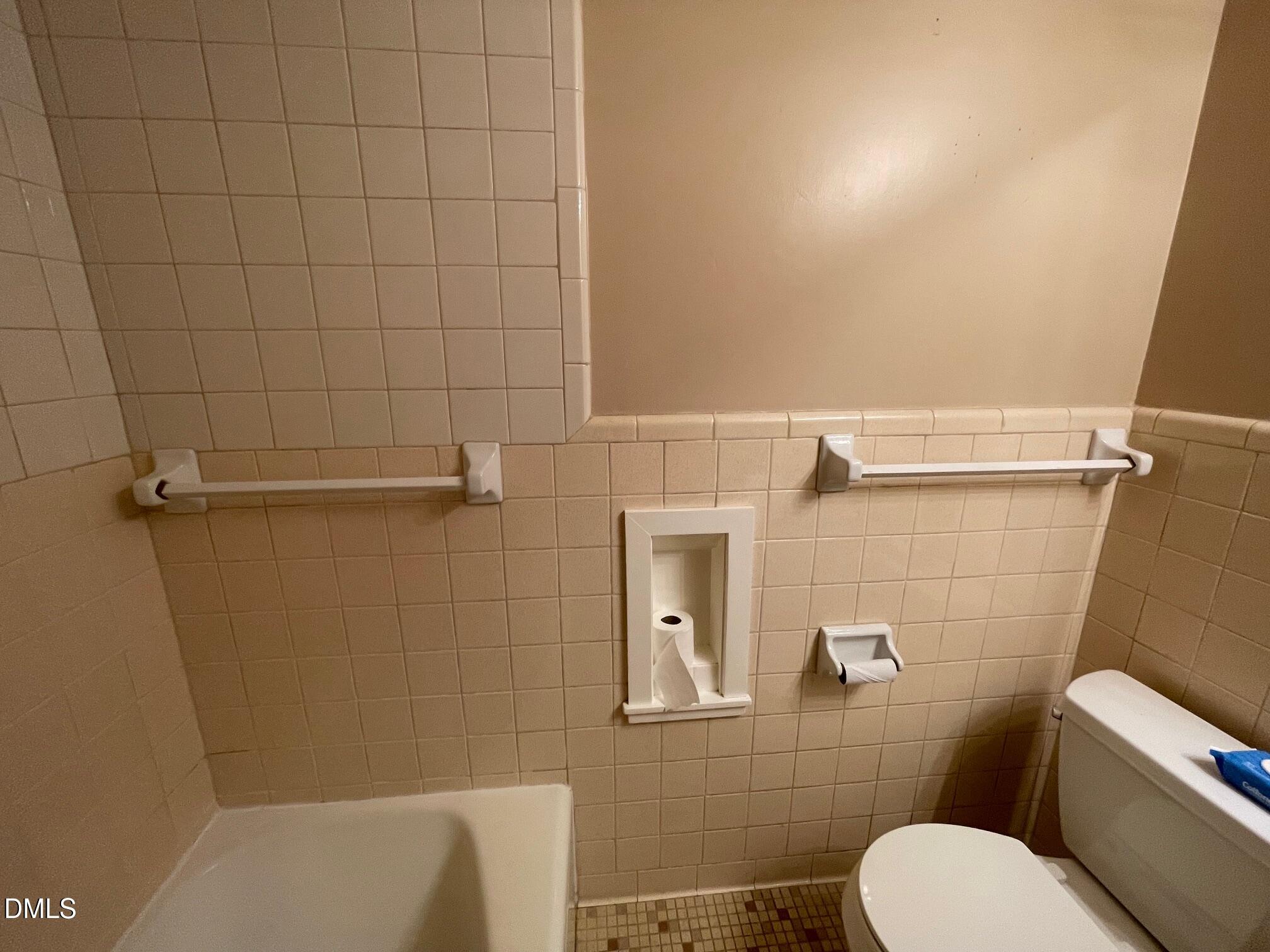 280 Montague Road Angier, NC 27501 - Photo 11 of 28 a bathroom with a toilet and shower