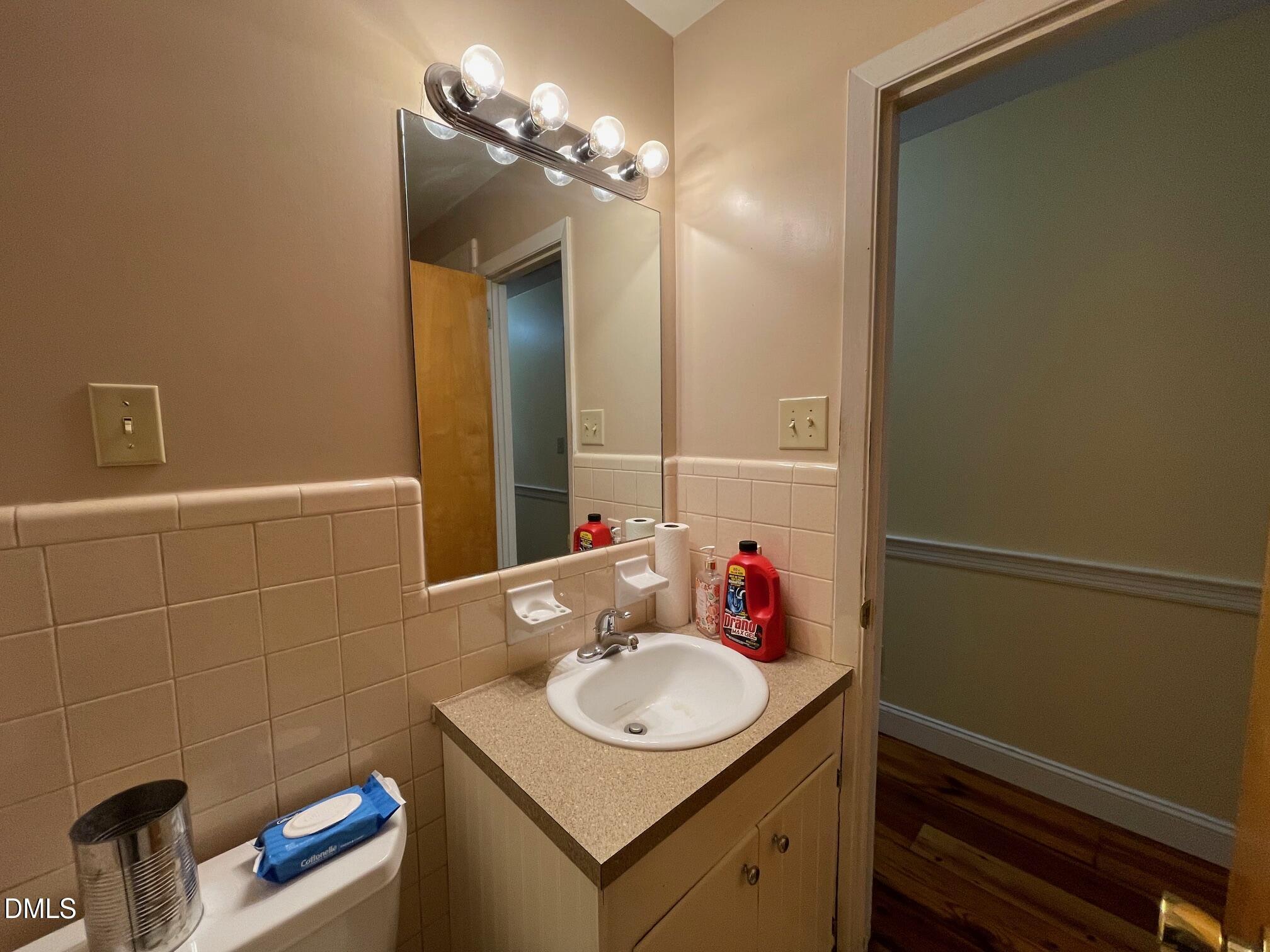 280 Montague Road Angier, NC 27501 - Photo 13 of 28 a bathroom with a sink vanity and a mirror